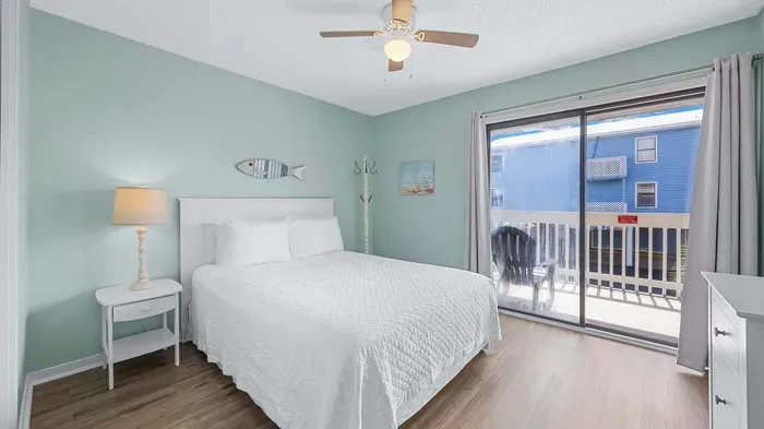 Guest bedroom with balcony access