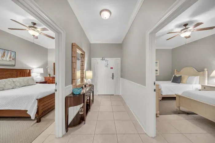 View of entry way to unit and hall looking into the guest bedrooms