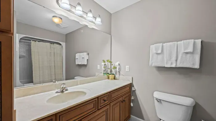 Guest bathroom attached to first guest bedroom