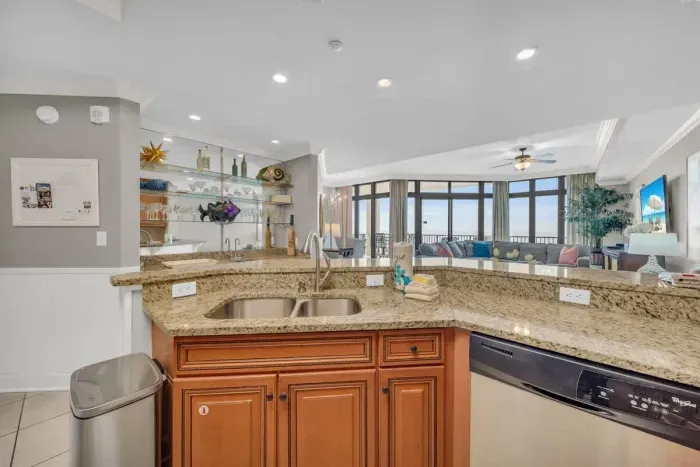 Kitchen overlooks living room area