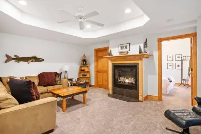 Family Room Retreat: Relax by the fireplace in this charming, nature-inspired haven!