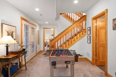 Game Room: Kick back and challenge friends with foosball in this inviting space!