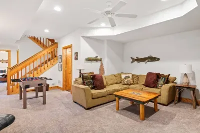 Family Room: Relax in style with game night fun and rustic charm in Galena!