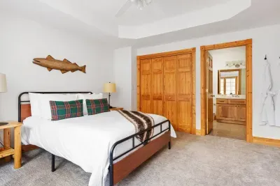 Bedroom Retreat: Dive into relaxation with rustic charm and plush comforts in this inviting, en-suite space!