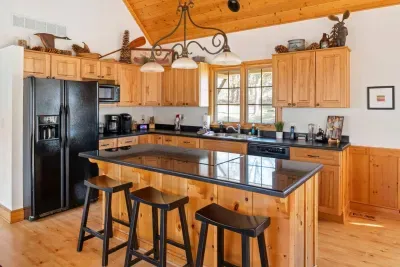 Rustic Kitchen: Whip up culinary delights in this spacious, sunlit kitchen with modern touches!