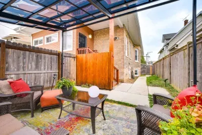 Outdoor Lounge: Relax under the canopy in vibrant furniture and lush greenery. Perfect for gatherings!