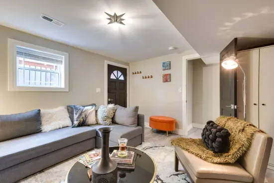 Living Room: Chic comfort awaits in this stylish retreat with vibrant decor and inviting light!