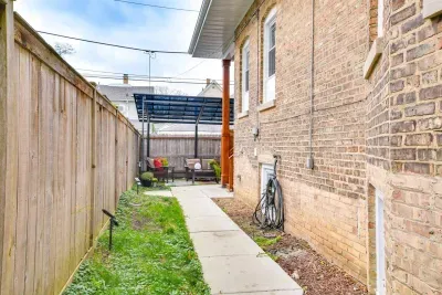 Outdoor Retreat: Enjoy the serene patio with cozy seating, perfect for relaxation and great conversations!