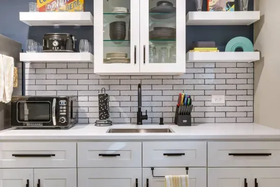 Kitchen: Sleek modern design with a pop of color—perfect for culinary adventures!