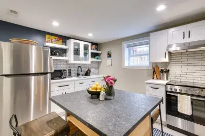 Kitchen Delight: Enjoy crafting meals in this stylish kitchen with modern appliances and cozy decor!