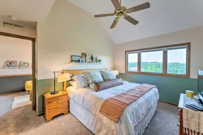 Upper Level King Retreat: Tranquil bedroom with stunning views, plush bedding, and warm decor!