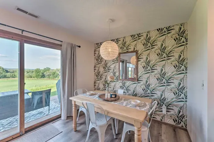 Dining Room: Bright space with scenic views, perfect for meals and memories with family and friends!