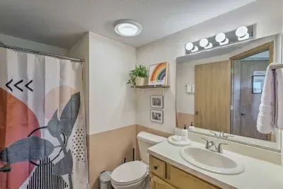 Main Level Bathroom: Stylish decor and modern fixtures await for your refreshing retreat!