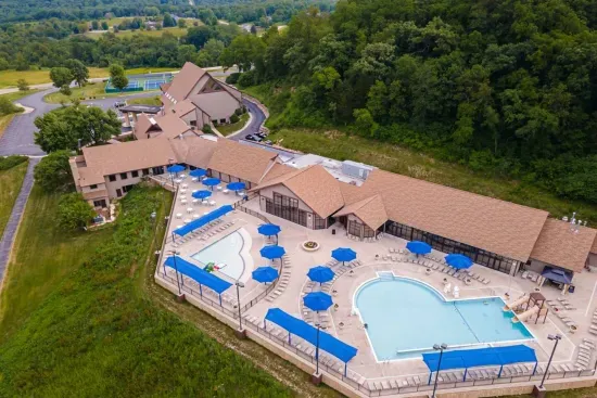 Outdoor Oasis at The Owners Club: Dive into fun with our sparkling pools and vibrant sun loungers. Perfect for relaxation!