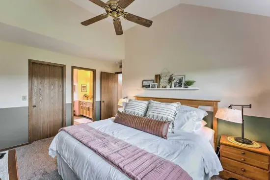Upper-Level Bedroom: Bright retreat with fluffy bedding and stylish decor for your perfect getaway!