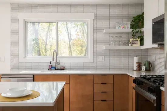 Kitchen: Bright and stylish space with sunshine views and modern appliances for culinary adventures!