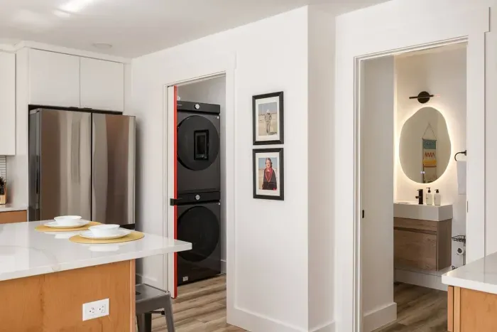 Modern Kitchen & Additional Full Bath: Enjoy seamless cooking with sleek appliances and stylish design.