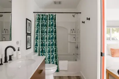 Bathroom Oasis: Bright and stylish bathroom with chic decor and luxury essentials awaits!