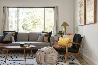 Living Room: Bright and airy space with stylish decor and a view to nature’s beauty!