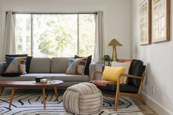 Living Room: Bright and airy space with stylish decor and a view to nature’s beauty!