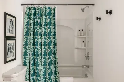 Bathroom Retreat: Refresh in style with vibrant decor and modern amenities! Luxury toiletries include shampoo, conditioner, body wash and moisturizer!