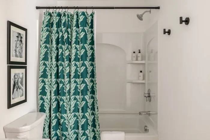 Bathroom Retreat: Refresh in style with vibrant decor and modern amenities! Luxury toiletries include shampoo, conditioner, body wash and moisturizer!