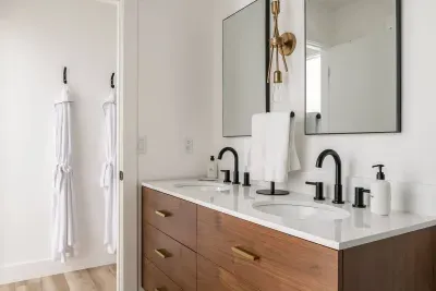 Luxurious Bathroom: Double vanities and sleek fixtures create a chic retreat for relaxation!