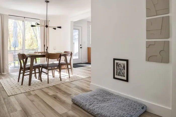 Dining Room: Bright and airy space with modern decor, perfect for meals and game nights!