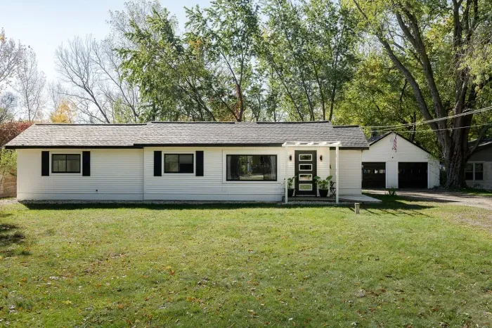 Charming Mid-Century Exterior: Enjoy beautiful views from this inviting home surrounded by nature's splendor!