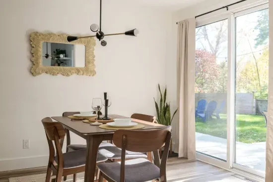 Dining Room: Enjoy meals in style surrounded by natural light and a chic, modern vibe! Bar cart added for extra fun this year!