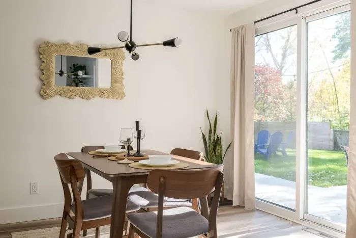 Dining Room: Enjoy meals in style surrounded by natural light and a chic, modern vibe! Bar cart added for extra fun this year!