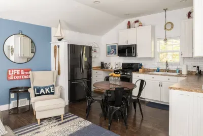 Charming Kitchen: Bright and airy space with lake vibes, perfect for cooking up vacation memories!