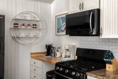 Kitchen Delight: Modern appliances and stylish decor make cooking a pleasure! Enjoy gourmet meals!