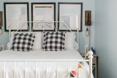 Bedroom Retreat: Enjoy nautical charm with vibrant decor and a restful ambiance!