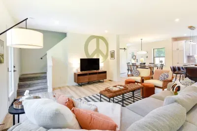 Living Room: Bright and inviting space with playful decor, perfect for unwinding or gathering!