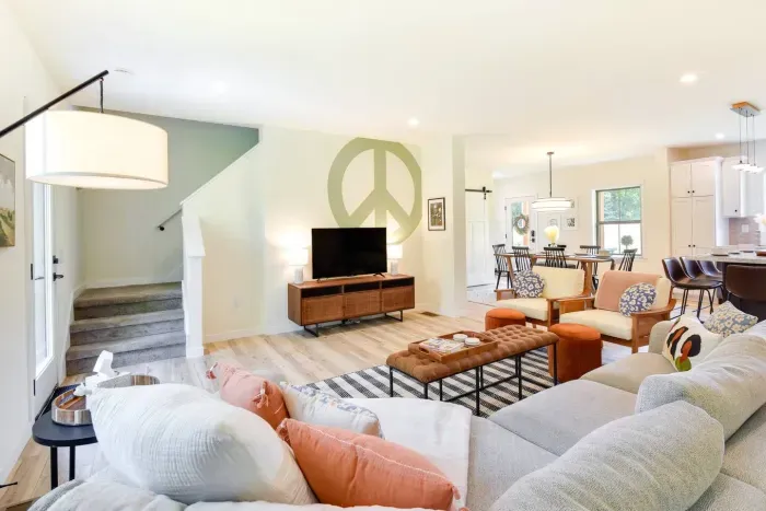 Living Room: Bright and inviting space with playful decor, perfect for unwinding or gathering!