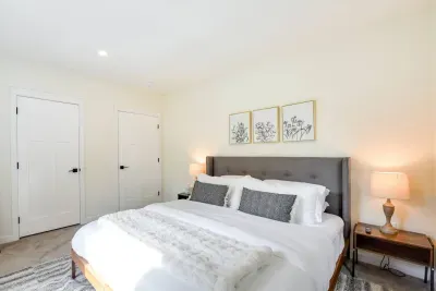 King Bedroom Retreat: Stylish decor, plush bedding, and soft lighting create a serene getaway!