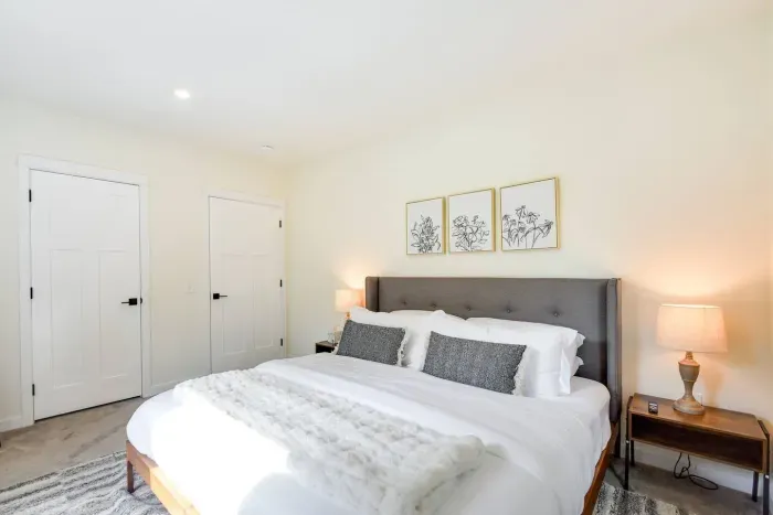 King Bedroom Retreat: Stylish decor, plush bedding, and soft lighting create a serene getaway!
