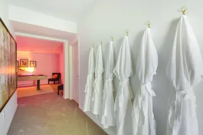 Spa Sanctuary: Unwind in style with plush robes and soothing lighting leading to relaxation bliss!