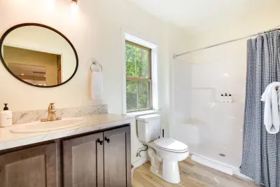 Bathroom Retreat: Bright space with natural light, luxury toiletries, and chic decor awaits you!
