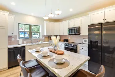 Gourmet Kitchen: Cook up culinary delights with modern appliances and a spacious island!