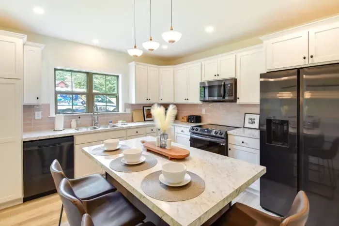 Gourmet Kitchen: Cook up culinary delights with modern appliances and a spacious island!