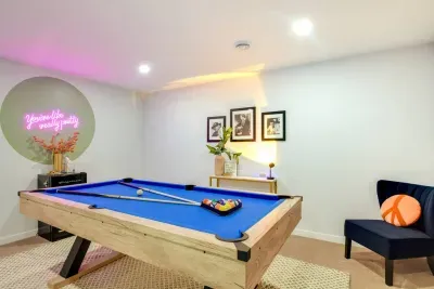 Game Room: Unleash your competitive spirit with pool and vibrant decor! Perfect for fun nights!