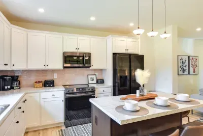 Kitchen Oasis: Modern appliances and stylish decor await your culinary adventures!