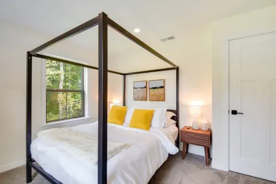 Serene Queen Bedroom Retreat: Enjoy tranquil views and stylish décor in this charming haven!