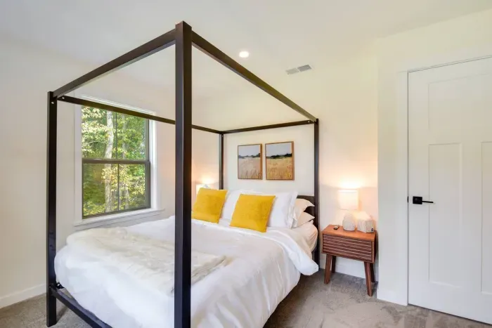 Serene Queen Bedroom Retreat: Enjoy tranquil views and stylish décor in this charming haven!