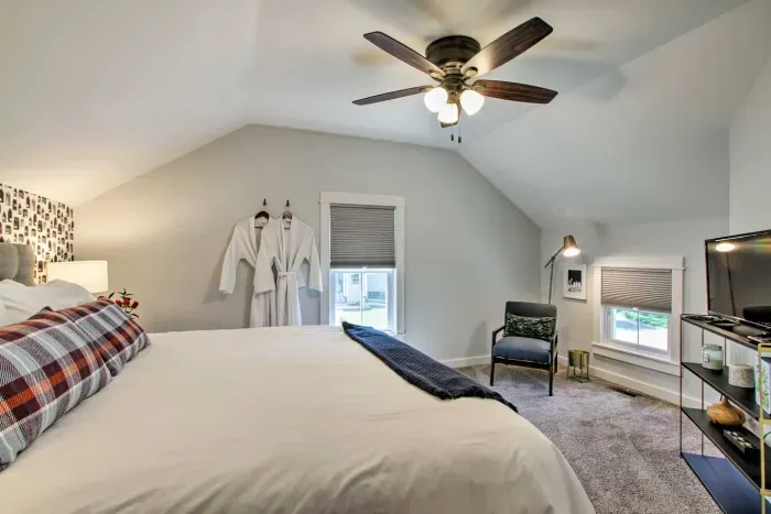 Spacious King Bedroom Retreat: Relax in style with plush bedding and serene views just outside!