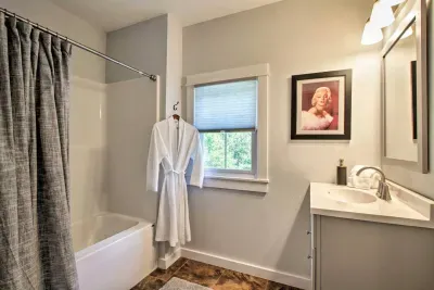 Elegant Upper Level Bathroom: Refresh with flair in this stylish retreat featuring chic decor and natural light!