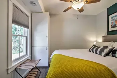 Charming Queen Bedroom Retreat: Bright space with stylish decor and serene garden views await you!