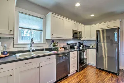 Kitchen: Whip up delicious meals in this sunny, stylish kitchen with modern appliances!